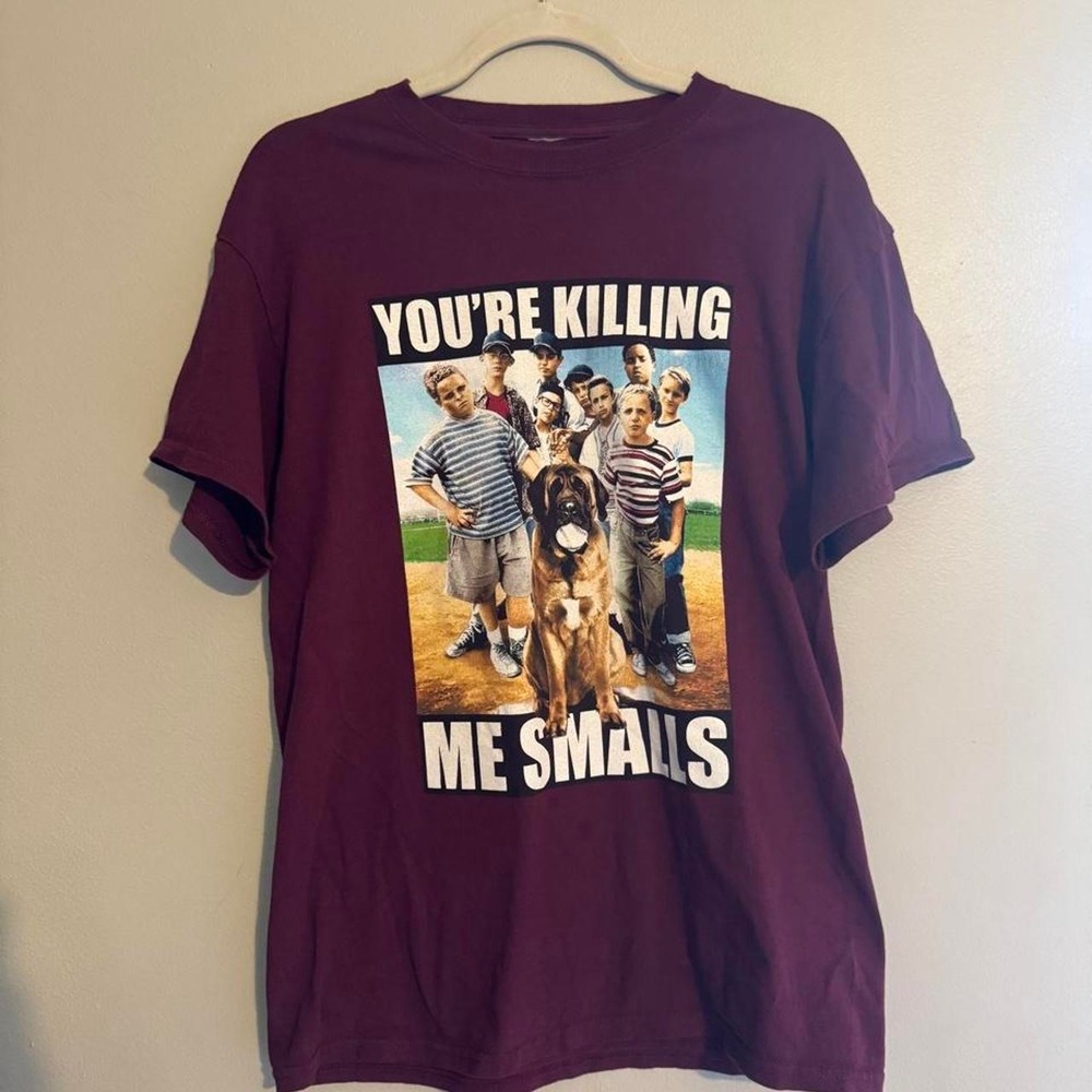 Burgundy "You're Killing Me Smalls" graphic tee with group of people and a dog